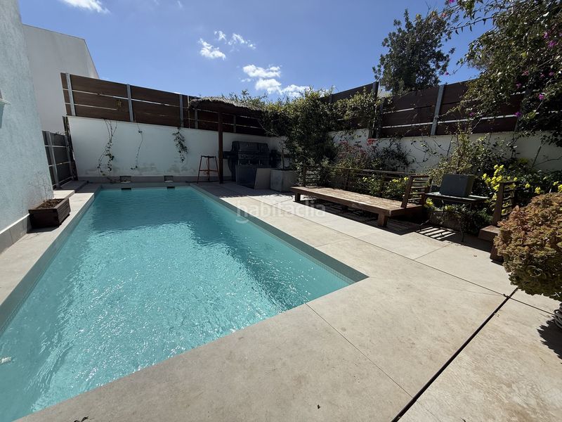 Foto 6255a220-f591-433a-beb1-ff6f3f889399. Casa aparellada amb calefacció aparcament piscina a Santa Eulària