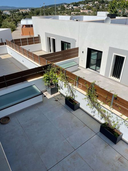 Foto 6ee69f98-b826-42f6-a49f-e6379cf7495d. Casa aparellada amb calefacció aparcament piscina a Santa Eulària