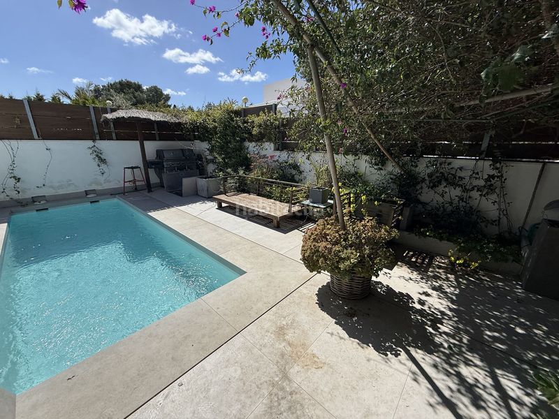 Foto c9d8b004-f110-48ef-a5bf-2f7f93d822f7. Casa aparellada amb calefacció aparcament piscina a Santa Eulària