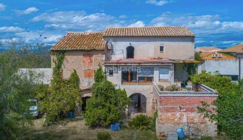 Foto 1e644b3e-f3a2-47b7-afec-72f3eb69590e. Masia amb calefacció aparcament a Garrigàs