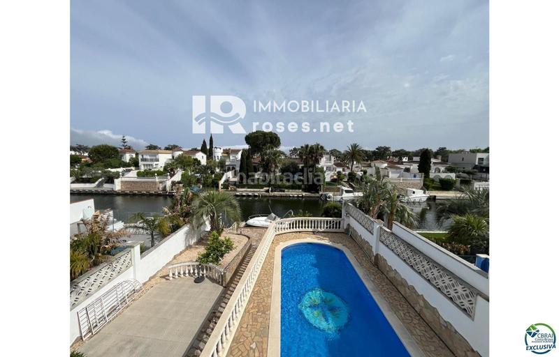 Foto 6dc98485-faed-4cae-8305-b737524a9401. Casa en venta casa al canal orientación sudeste , terreno de 542m2 y amarre de 12m en Empuriabrava