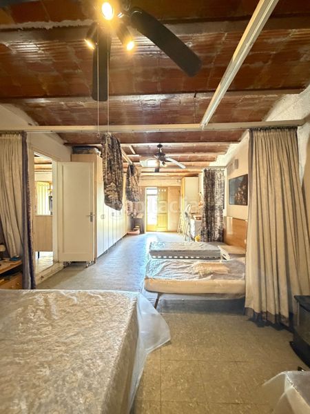 Foto 0c0339e4-055b-4c6e-80fe-ba0c769bad1e. Parking coche lote de 3 garajes y gran parcela en parque natural en Roses