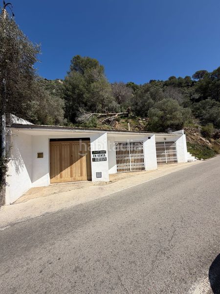 Foto 86be6216-768b-4a90-89db-ff969cad29d8. Parking coche lote de 3 garajes y gran parcela en parque natural en Roses