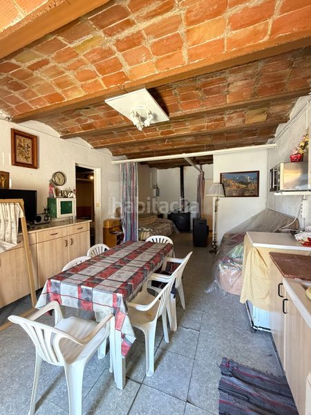 Foto ddb3b232-0464-4659-803e-b9981f03f4d1. Parking coche lote de 3 garajes y gran parcela en parque natural en Roses