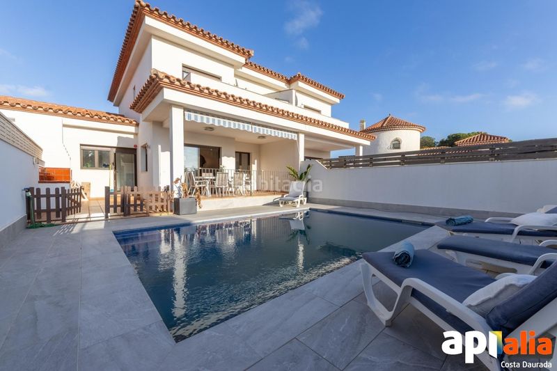 Foto 59c47574-4d39-490e-bfa4-c6acd3ace21d. Casa adossada amb calefacció aparcament piscina a Miami Platja