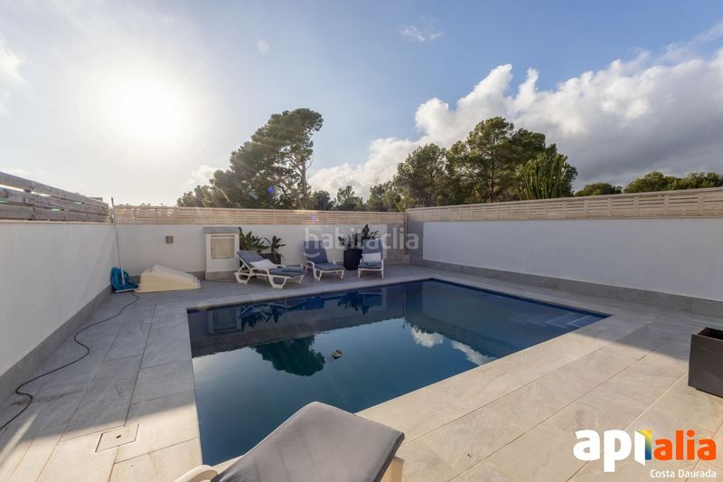 Foto c8c5e6fa-9ac6-408d-b427-5a2e6e5047eb. Casa adossada amb calefacció aparcament piscina a Miami Platja