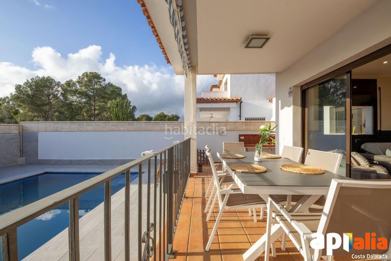 Foto f863e622-b40e-48c1-b66f-6970dedfb739. Casa adossada amb calefacció aparcament piscina a Miami Platja
