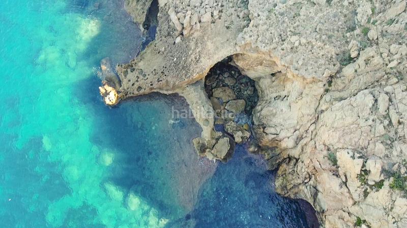 Foto 59a0bd0d-01dd-48fb-8457-1dff6d364f4d. Casa adossada amb aparcament piscina a Cala Ratjada Capdepera