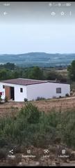 Rural plot in Avinguda terra alta 37. Finca de 4,7 hectáreas, llana, con una nave de 100 m2 y dos casa