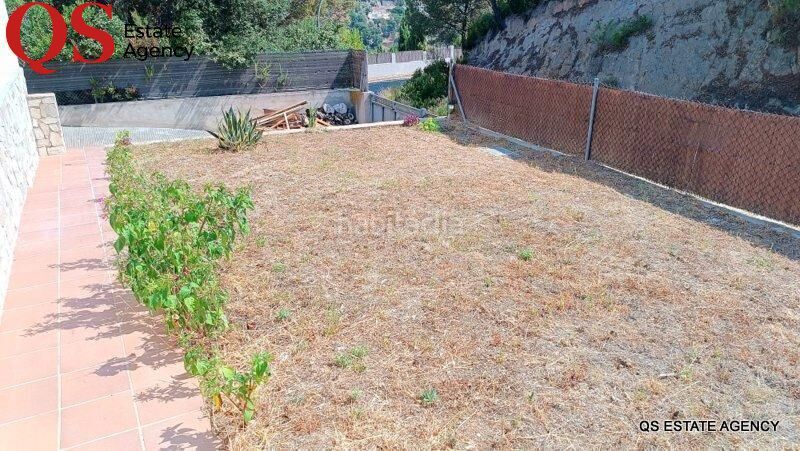 Foto 1821ba58-5728-4300-a62d-3f41373cc3de. Casa amb calefacció aparcament piscina a Lloret Residencial - Montlloret Lloret de Mar