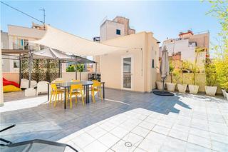 Edifici a Pere Garau. Edificio unifamiliar con un chalet adosado en palma.