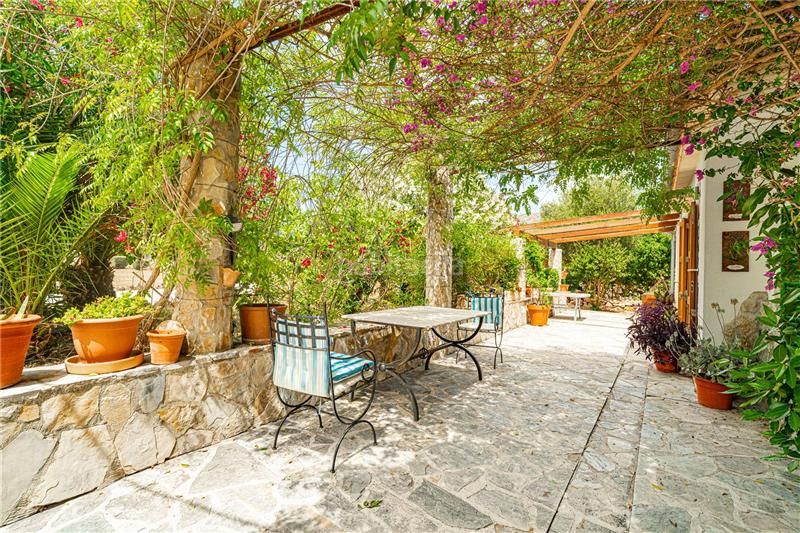 Foto e8cf2bf0-6046-48a9-857d-cedb7142d883. Masia amb xemeneia calefacció aparcament piscina a Pollença