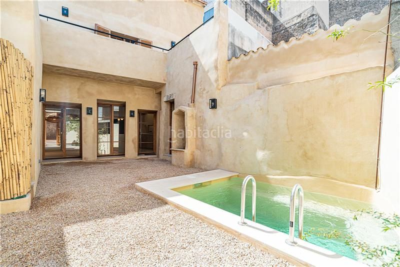Foto 4bd8ba7d-4e6d-4fea-9f78-cb2a7bbe51ff. Xalet amb xemeneia calefacció aparcament piscina a Algaida