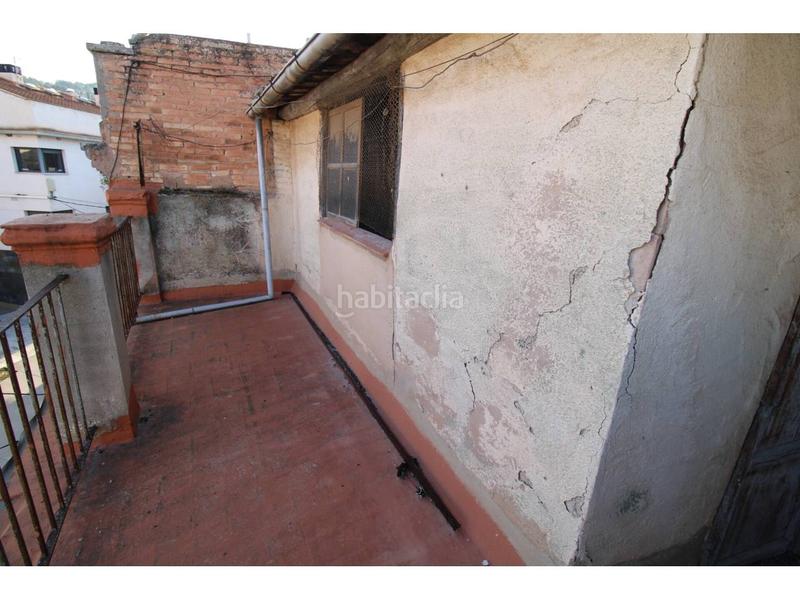 Foto b2cd41ca-1800-49ab-9f33-5e2e0c754100. Casa  nucli antic montbui con 455 m2 de jardí en Santa Margarida de Montbui