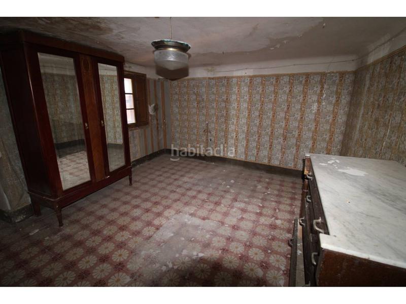 Foto dd10b128-f01e-4c9a-af05-c7fdf654d85d. Casa  nucli antic montbui con 455 m2 de jardí en Santa Margarida de Montbui