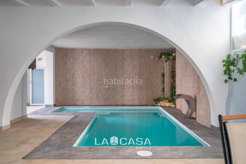 Foto 0c0d38a9-5e3d-4a70-b12b-380355d248ce. Casa amb calefacció aparcament piscina a Lluminetes Castelldefels