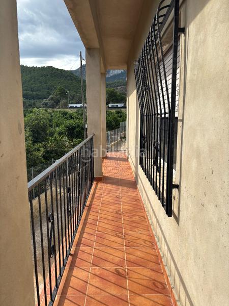 Foto da871fe4-e0f7-4c92-8a07-7d6c0e116530. Chalet mit kamin parking in Llaurí