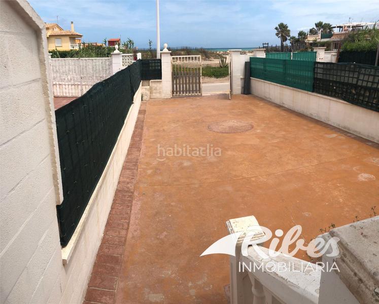 Foto 4f2406c6-271f-44fe-acb6-5ccd4cc6092c. Casa a schiera con riscaldamento parcheggio in El Marenyet Cullera