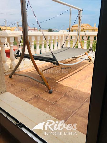 Foto edd41799-ced0-4b84-b34c-de411228cb3b. Casa a schiera con riscaldamento parcheggio in El Marenyet Cullera