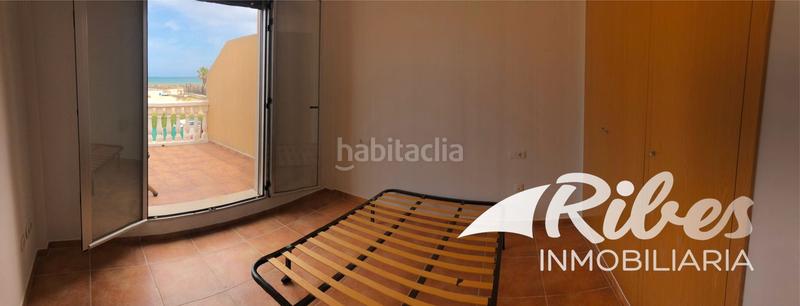 Foto 716a4dc6-bd0b-413d-80d0-1b79022329aa. Casa adossada amb calefacció aparcament a El Marenyet Cullera
