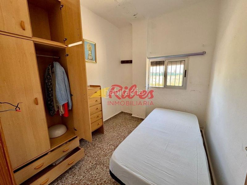 Foto 10e9c5fa-e753-4758-85c0-874852fb83fc. Casa a numero 19 82 a El Dossel - Mareny de San Lorenzo Cullera