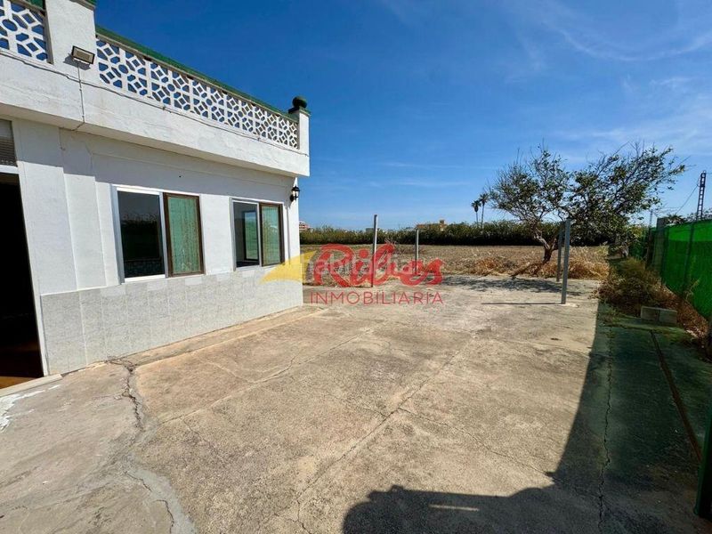 Foto 90ec6a65-25a7-41df-bf39-eabd548e9a34. Casa a numero 19 82 a El Dossel - Mareny de San Lorenzo Cullera