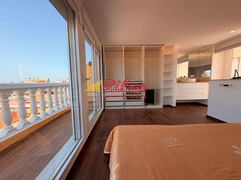 Foto 49167272-a198-44fa-834f-656a14076584. Casa adossada amb aparcament a El Marenyet Cullera