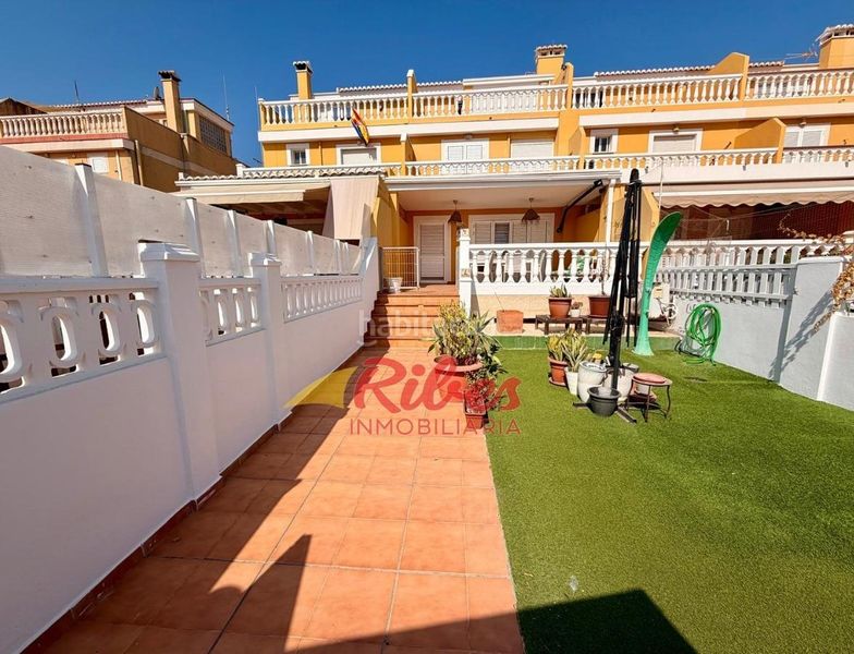 Foto bb2659a1-eca9-432d-a14a-108f4268b41c. Casa adossada amb aparcament a El Marenyet Cullera