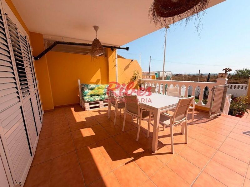 Foto eb1c1d6f-fdfb-4178-b853-a3f768d76ac9. Casa adossada amb aparcament a El Marenyet Cullera