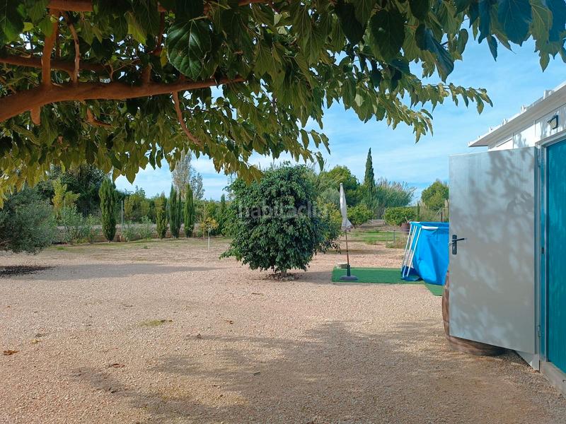 Foto a8878fa1-c8b0-462e-a363-f890f2b1064a. Rural plot in Sueca Sueca