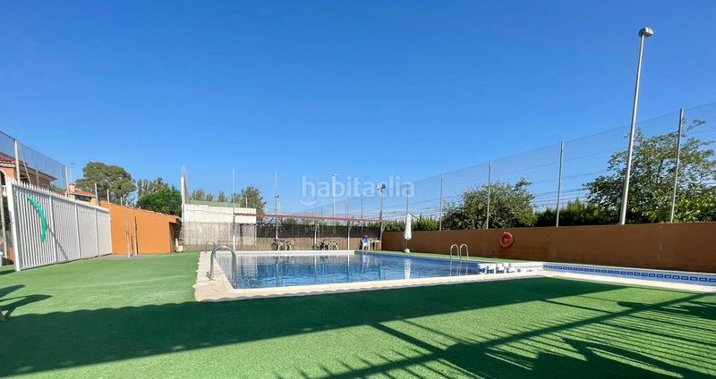 Foto 45d6fd73-0fd5-46a8-aae1-07da0f1039ca. Casa aparellada amb aparcament piscina a Sueca Sueca