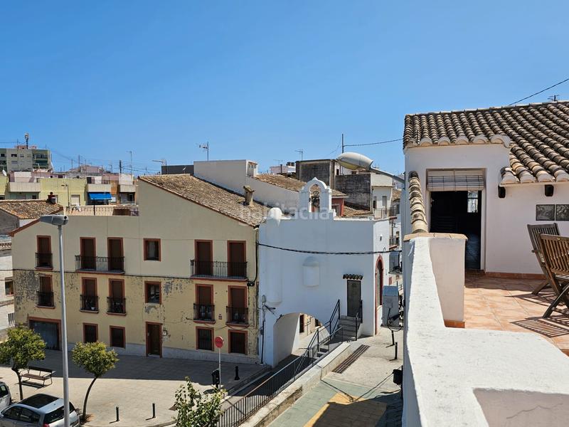 Foto d68f5f38-aaf1-43fa-a6c7-701c0746fd65. Casa  en el centro con terraza y vistas en Oliva pueblo Oliva
