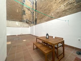 Location Appartement à Sants-Badal. Bajo con terraza en alquiler temporal