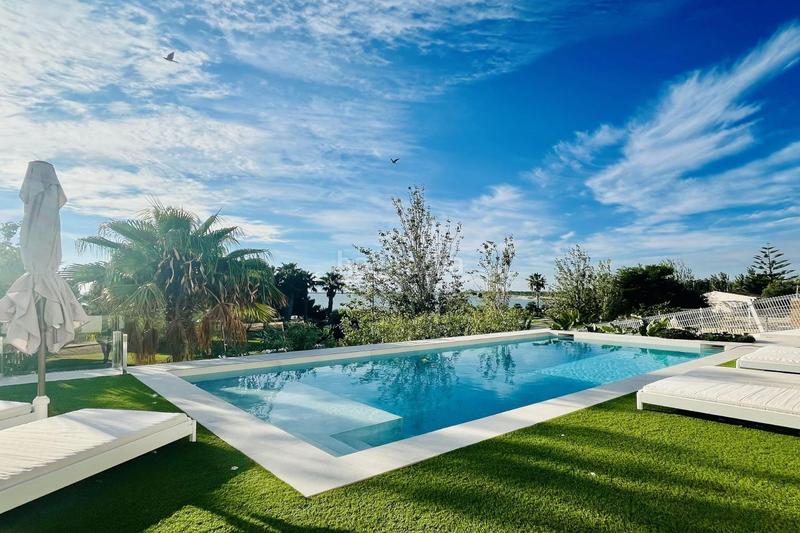 Foto 5a35b5d9-cf71-4d9e-97bd-8bd8dda3a545. Chalet en passeig arenal exclusiva villa de lujo en primera línea de mar en Ampolla (L´)