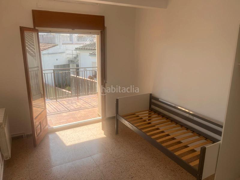 Foto 62d5f31e-27d5-41f4-871c-744507142a5e. Casa adossada amb xemeneia calefacció aparcament a Banyoles