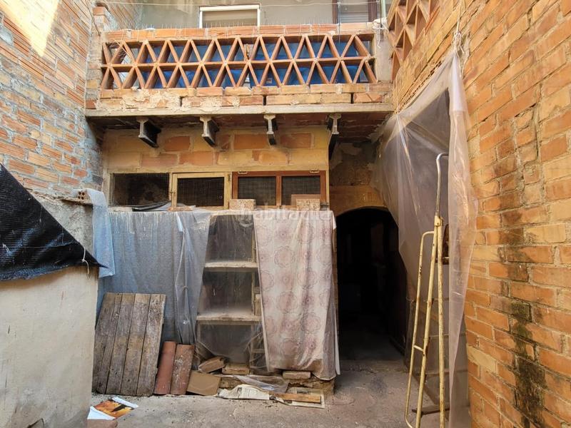 Foto 67ee103b-3a2c-4740-8588-62f034b0a0cb. Casa a schiera con riscaldamento parcheggio in Poal (El)