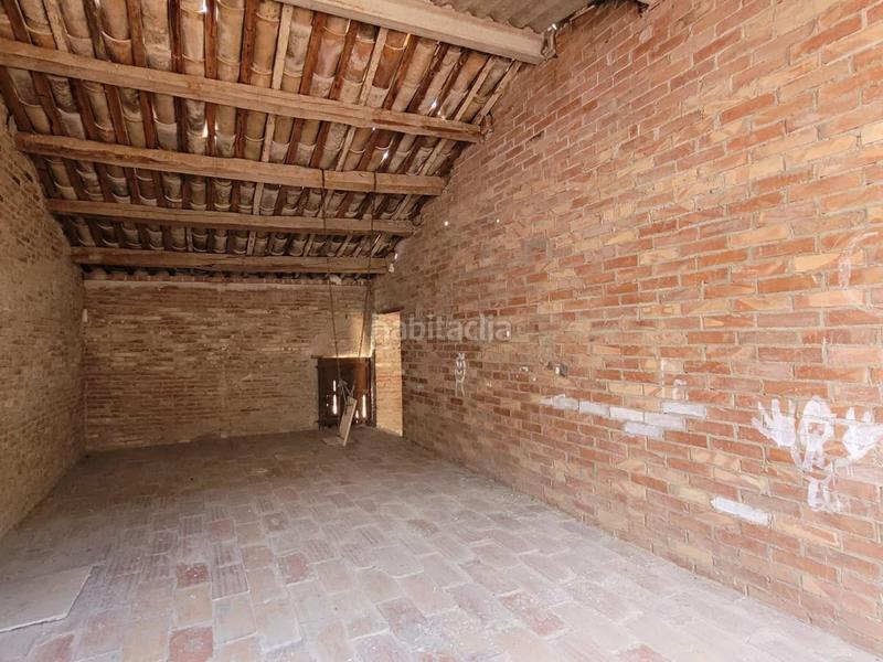 Foto 9d12263a-bfd3-4386-b89c-d663b64a6ff2. Casa a schiera con riscaldamento parcheggio in Poal (El)