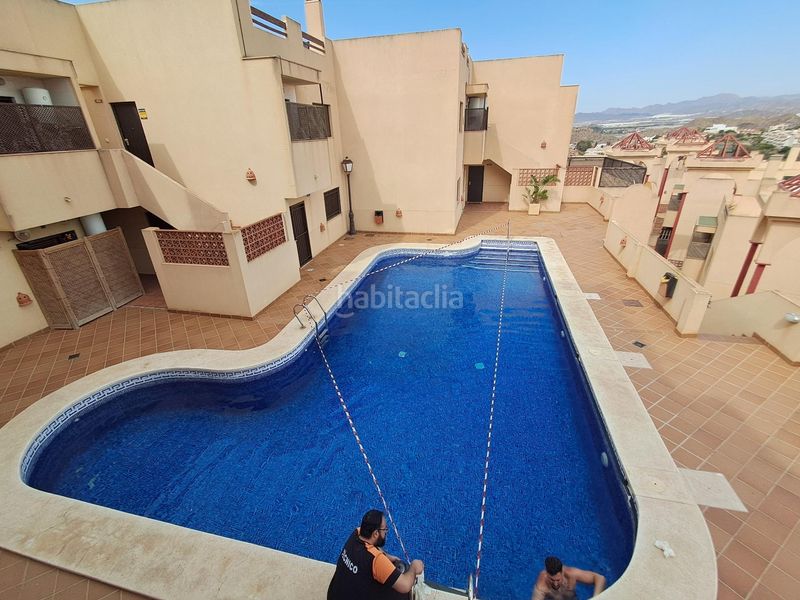 Foto c7e5f14b-24f9-4f8e-895a-8504ac4feed0. Dúplex amb calefacció aparcament piscina a Los Collados-Los Geraneos Águilas