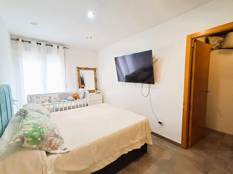 Foto c56344ef-b0f8-437b-a401-050f5f9bc750. Casa adossada amb calefacció aparcament a Águilas