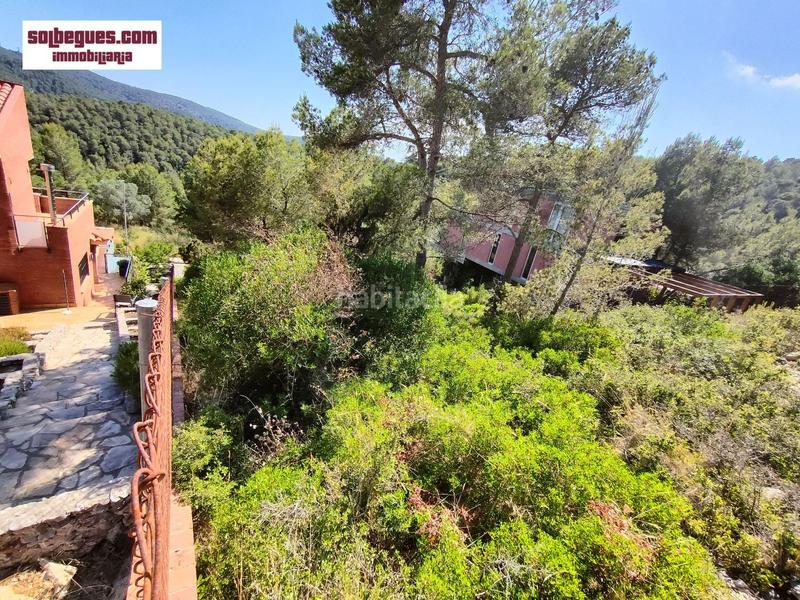 Foto c51466eb-3de6-4eb4-80d4-4934bcd6bbb6. Terreno residencial en turia 34 parc. terreno con magnificas vistas en Begues