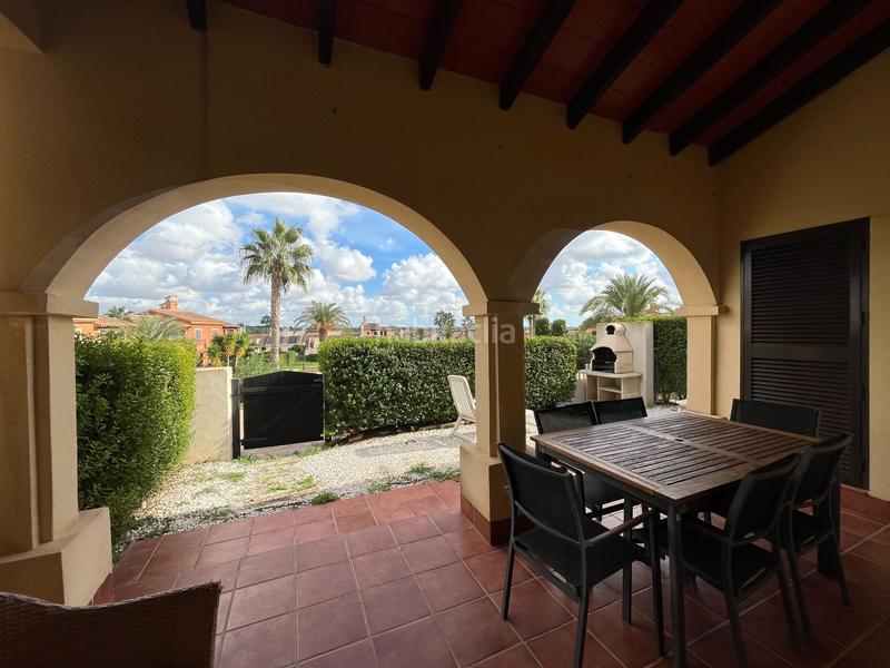 Foto d40fda0a-b066-4908-b1b2-d8c27f47d607. Casa adossada amb piscina a Hacienda del Álamo Golf Fuente Álamo de Murcia
