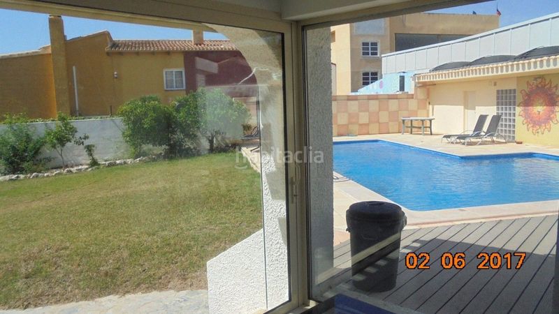 Foto cee2b7a5-ec92-41d2-a3a6-ad3f0541cdff. Chalet cerca playa en Punta Prima Orihuela