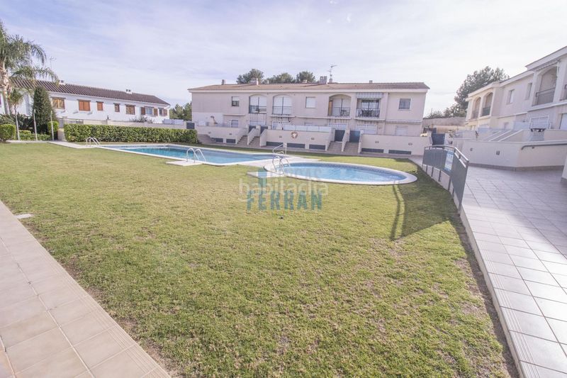 Foto 518c9354-290f-4db7-8f8e-2182667646f2. Apartament amb calefacció aparcament piscina a Els Masos - Els Garrofers Coma-ruga