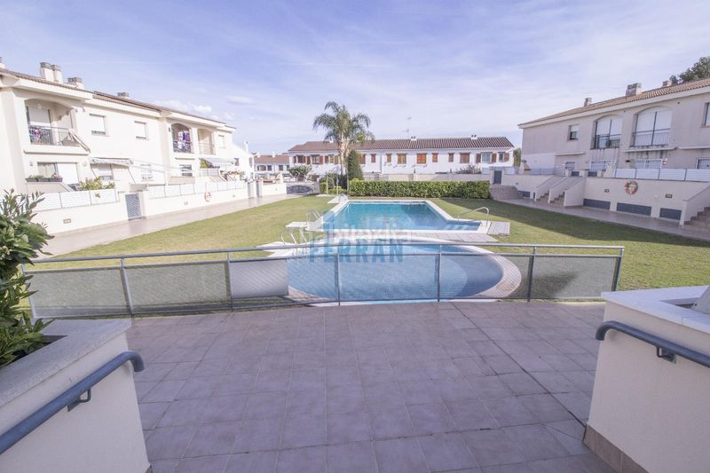 Foto aa2ccbfa-d572-466e-8be7-1b51f0498fc4. Apartament amb calefacció aparcament piscina a Els Masos - Els Garrofers Coma-ruga