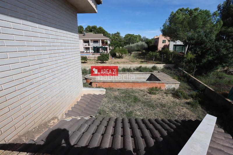 Foto 171c35df-0937-4bf5-a2a3-7f85a7be1f53. Chalet avec parking dans Urbanizaciones Llíria