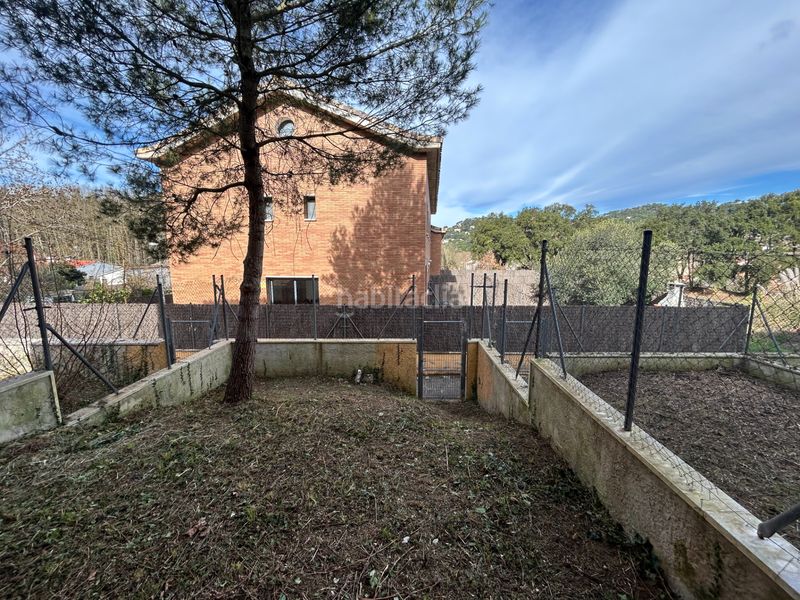 Foto efde3f0b-8535-4762-8ddb-b5c2f3b832a7. Casa adossada amb aparcament a Vallgorguina