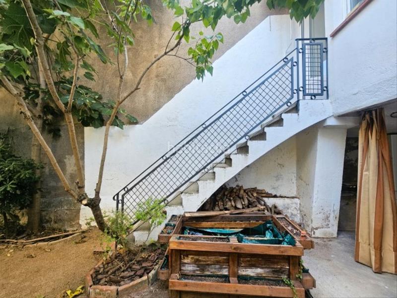 Foto 24a516a0-e68d-4335-ba95-7e786fdd23fa. Casa adossada amb xemeneia calefacció aparcament a Llinars del Vallès