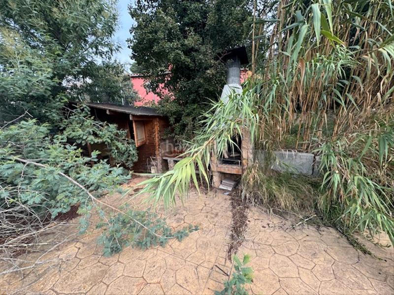 Foto d9099d2a-6820-43df-a488-b62c4f6c76ee. Chalet con parcheggio piscina in terrabrava - Tordera parc Tordera