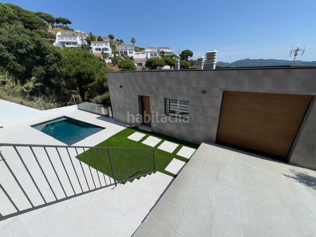 Foto b097cfa2-2c0b-4607-86ed-c8665a000a0d. Xalet amb xemeneia aparcament piscina a Urbanitzacions Sant Pol de Mar