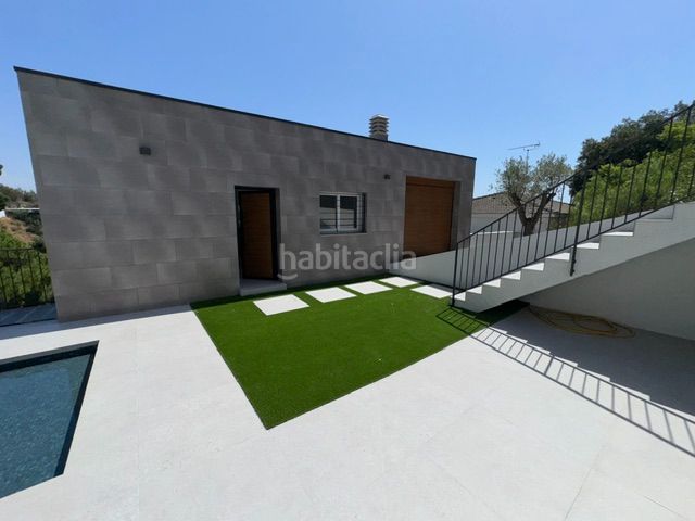 Foto f779efbf-d9a1-42e4-8d08-a00be29af2ac. Xalet amb xemeneia aparcament piscina a Urbanitzacions Sant Pol de Mar